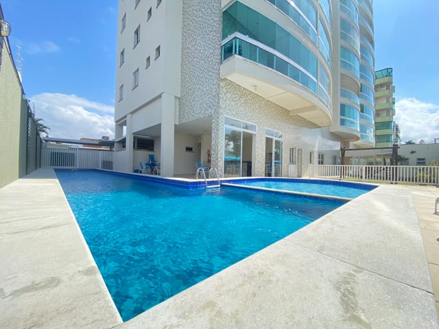 Foto do Apartamento - Apartamento à venda, 04 dormitórios, sendo 02 suítes, 02 vagas de garagem, 129m², Indaiá, Caraguatatuba, SP | Necta Serviços Imobiliários Ltda