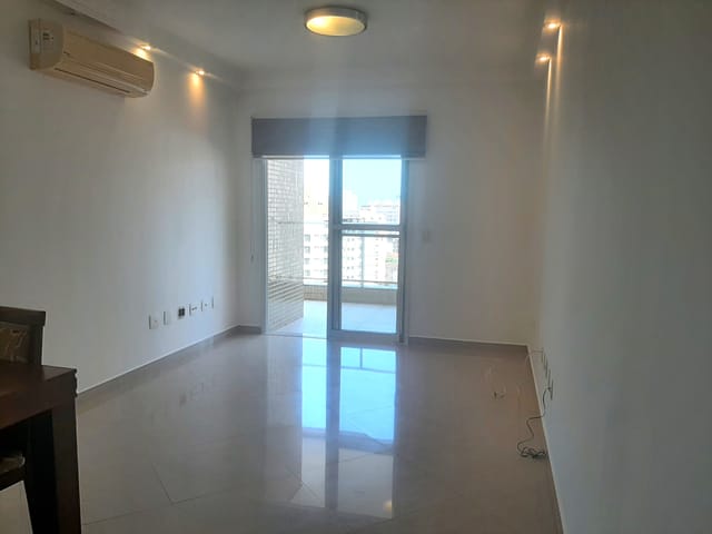 Foto do Apartamento - Apartamento para locação de 83 m² com 2 quartos com suíte e varanda gourmet envidraçada em andar alto no Gonzaga, Santos, SP | eHG Imóveis