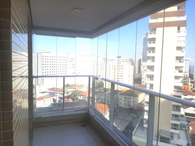Foto do Apartamento - Apartamento para locação de 83 m² com 2 quartos com suíte e varanda gourmet envidraçada em andar alto no Gonzaga, Santos, SP | eHG Imóveis