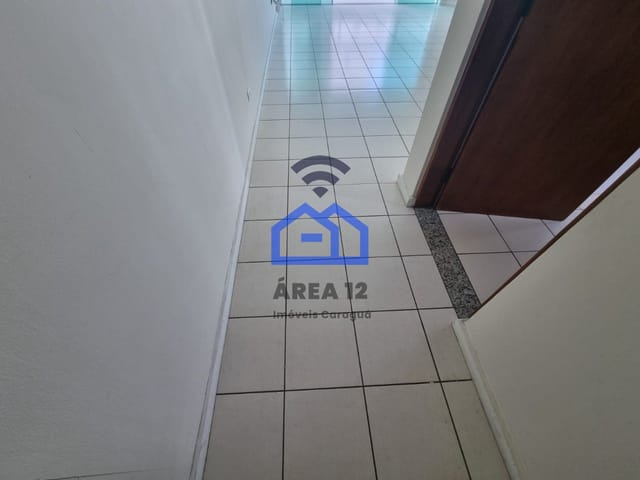 Foto do Apartamento - Apartamento à venda no Indaiá - 3 dormitórios, sendo 1 suíte, banheiro social, cozinha, sala com dois ambientes, piscina - Caraguatatuba, SP | Área 12 imóveis