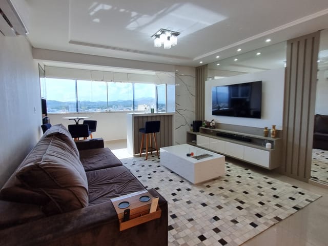 Foto do Apartamento - LINDO Apartamento a venda Finamente mobiliado, com área gourmet, e 3 dormitórios sendo uma suíte, em Tijucas/SC. Pronto para morar! | ATO CONSULTORIA IMOBILIARIA