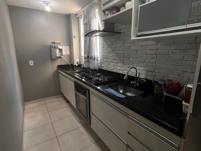 Foto do Apartamento - "Descubra Seu Refúgio de Conforto: Apartamento de 2 Quartos no Condomínio Ouro Verde, Barra Mansa - Open House" | OPEN HOUSE REAL ESTATE IMÓVEIS LTDA