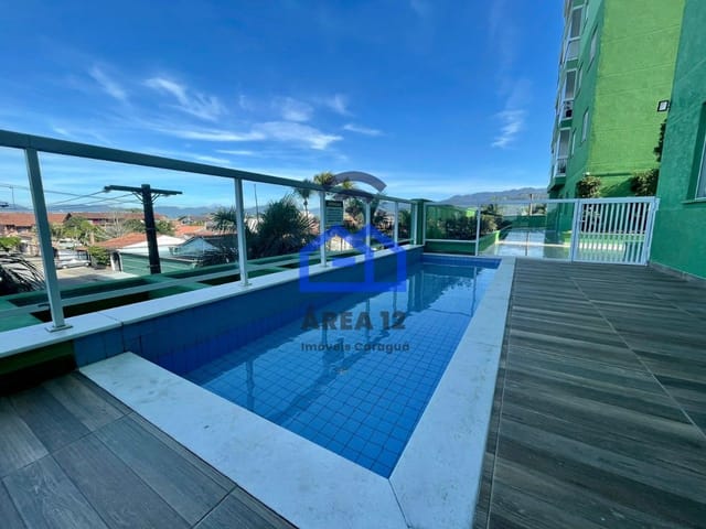 Foto do Apartamento - Apartamento à venda no Indaiá com 3 dormitórios, sendo 1 suíte, sala, cozinha, 2 vagas na garagem - Caraguatatuba, São Paulo | Área 12 imóveis