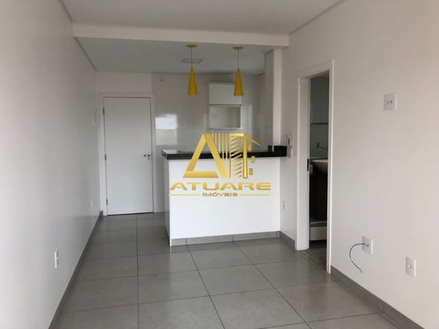 Foto do Apartamento - LOCAÇÃO | Apartamento novo no centro de Pouso Alegre, com 1 dormitório, sala, banheiro, cozinha americana com armários e conjugada com área de serviço | Atuare Imóveis