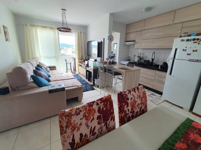 Foto do Apartamento - Apartamento semi-mobiliado de 2 dormitórios, com sacada e churrasqueira no Pagani/Palhoça. | Elite Imóveis