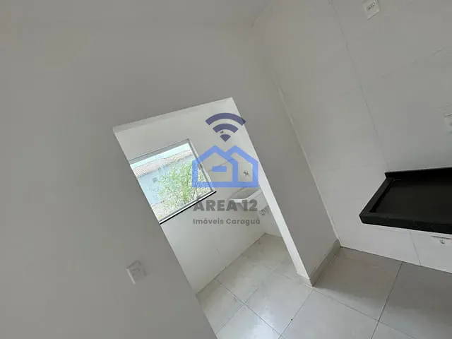 Apartamento com 70m² 2 quartos e 1 banheiro, à venda, no bairro Tarumãs em Caraguatatuba