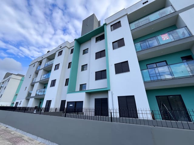 Foto do Apartamento - Apartamento à venda, com Sacada com churrasqueira e 02 dormitórios, sendo uma suíte em Vargem Grande - Florianópolis | Elite Imóveis