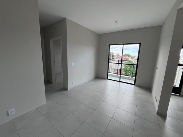 Foto do Apartamento - Apartamento à venda, com Sacada com churrasqueira e 02 dormitórios, sendo uma suíte em Vargem Grande - Florianópolis | Elite Imóveis