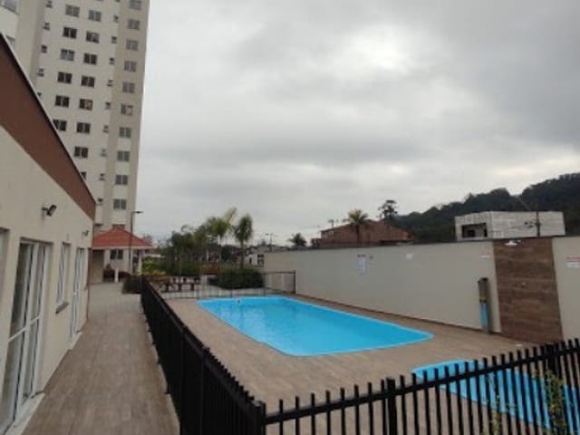 Foto do Apartamento - "Encantador apartamento semi-mobiliado com comodidades de clube no Residencial Porto Belo: o lar ideal para sua família!" | MACHADO CORRETORA DE IMÓVEIS LTDA