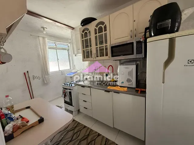 Apartamento 2 quartos e 1 banheiro, para alugar, no bairro Martim de Sá em Caraguatatuba