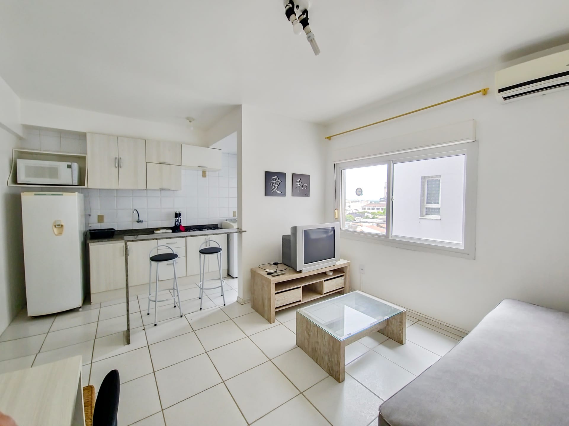 Apartamento aconchegante no Centro de Pelotas: Conforto, praticidade e modernidade em um só lugar! Agende sua visita agora mesmo!