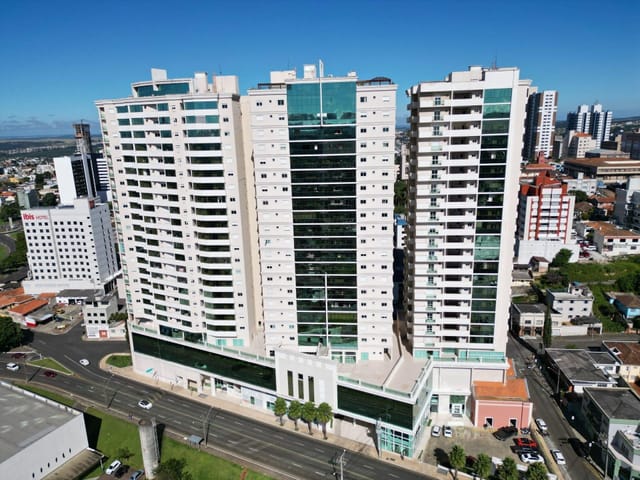Locação - Apartamento Semimobiliado, 3 quartos sendo 1 suíte, Churrasqueira, Edifício Santos Dumont, Centro.