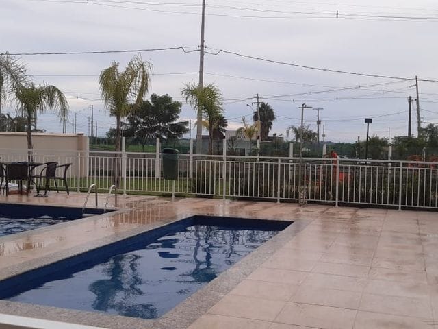 Foto do Apartamento - Apartamento a venda no Residencial Lago Maggiore (Acquaville) - 2 quartos - Sacada com churrasqueira - Piso Laminado | Guepardo Imob