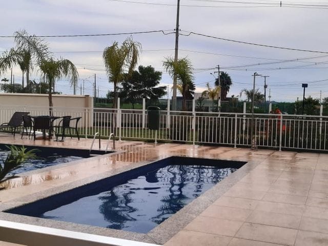 Foto do Apartamento - Apartamento a venda no Residencial Lago Maggiore (Acquaville) - 2 quartos - Sacada com churrasqueira - Piso Laminado | Guepardo Imob