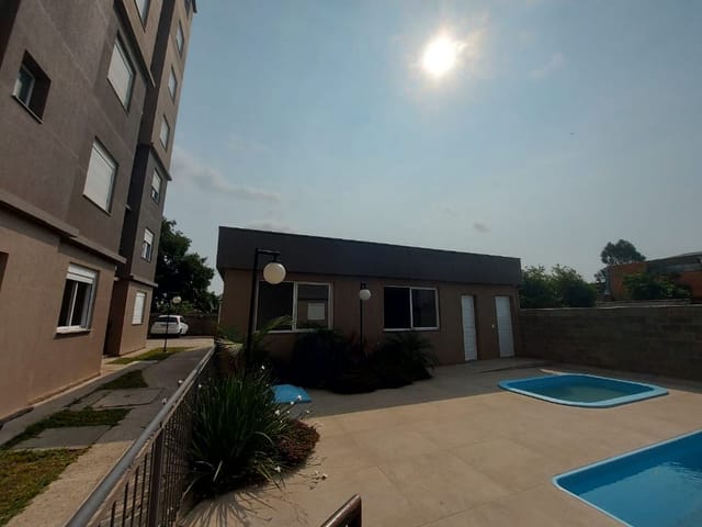 Foto do Apartamento - Apartamento Duplex com 2 dormitórios, 110 m² - venda por R$ 350.000,00 ou aluguel por R$ 2.910,00/mês - São Luiz - Gravataí/RS | Dimobi Cia Imobiliária