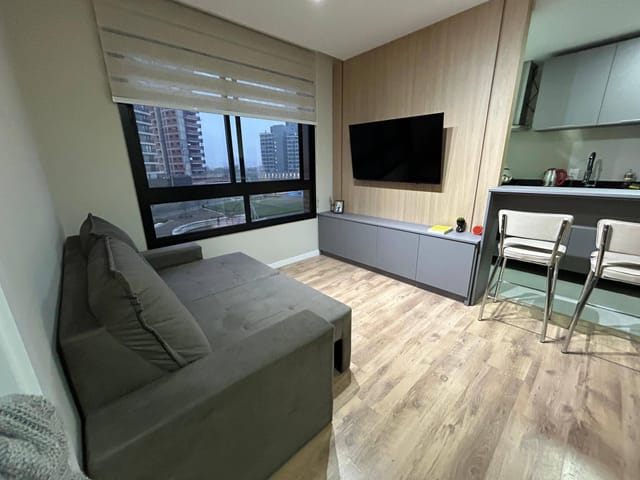 Foto do Apartamento - Apartamento mobiliado à venda no Canto, Parque Una: 40 m², 1 suíte, móveis planejados e vaga de garagem. | UP Imóveis