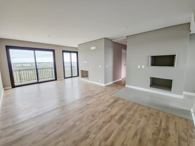 Foto do Apartamento - Apartamento à venda no condomínio Aires de Plaza, Parque Una, Pelotas, RS. 2 dormitórios, suíte, sacada, elevador privativo, lareira, portaria 24h. | UP Imóveis