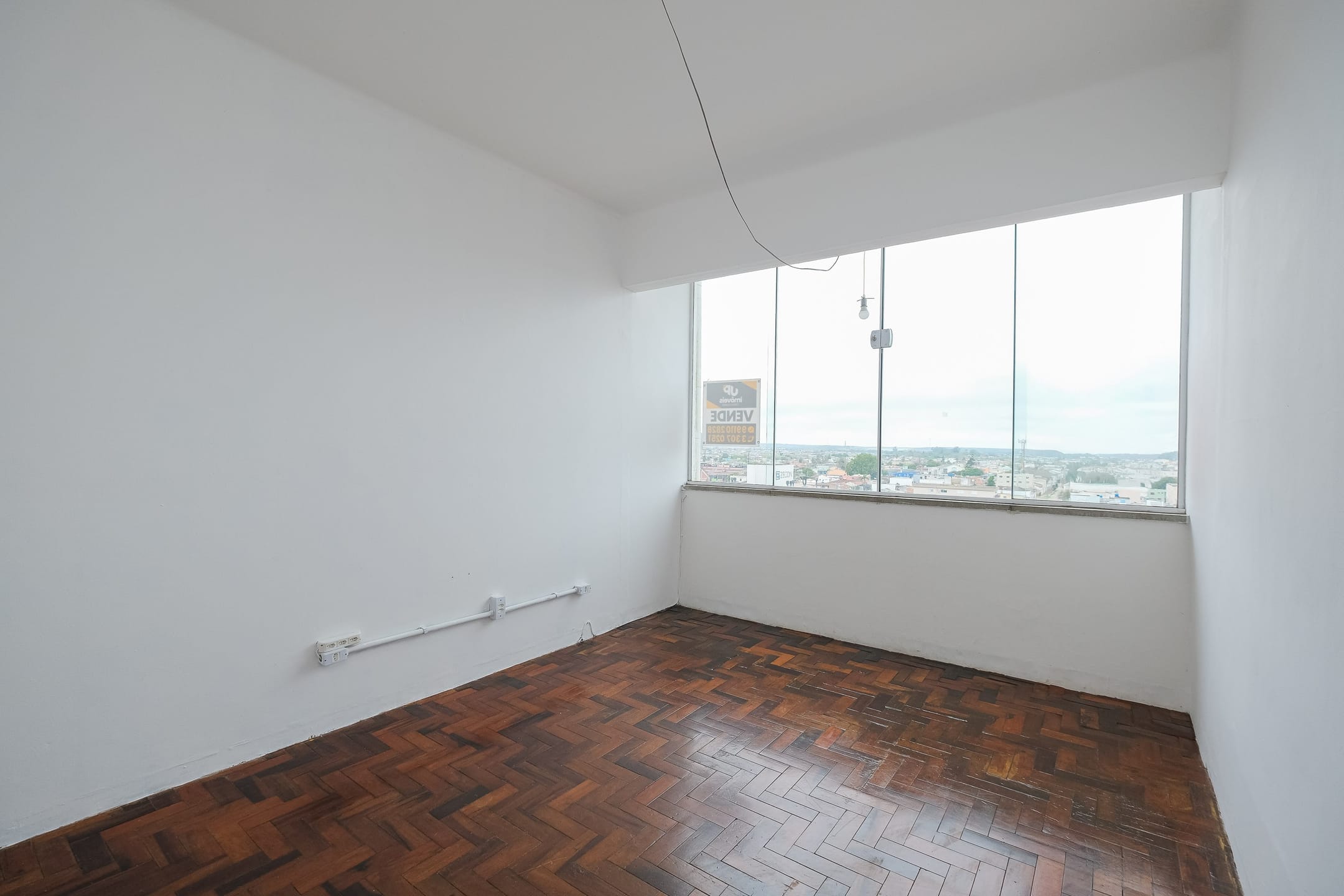 Apartamento de 2 dormitórios disponível para venda no Centro de Pelotas RS com ótima localização e praticidade para o dia a dia