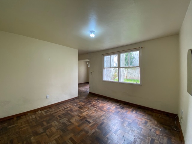 Foto do Apartamento - Apartamento à venda no Centro, Pelotas, RS. Área Útil 65 m², 2 dormitórios, 2 salas, 1 banheiro. Cozinha, lavanderia, e infraestrutura com portão eletrônico. | UP Imóveis