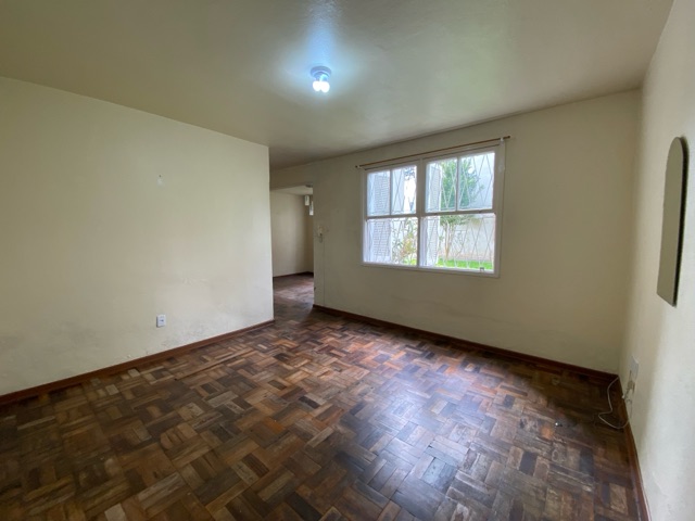 Foto do Apartamento - Apartamento à venda no Centro, Pelotas, RS. Área Útil 65 m², 2 dormitórios, 2 salas, 1 banheiro. Cozinha, lavanderia, e infraestrutura com portão eletrônico. | UP Imóveis