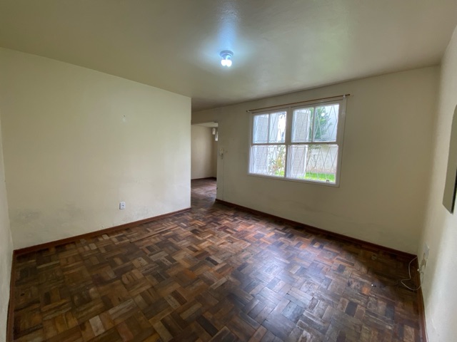 Foto do Apartamento - Apartamento à venda no Centro, Pelotas, RS. Área Útil 65 m², 2 dormitórios, 2 salas, 1 banheiro. Cozinha, lavanderia, e infraestrutura com portão eletrônico. | UP Imóveis