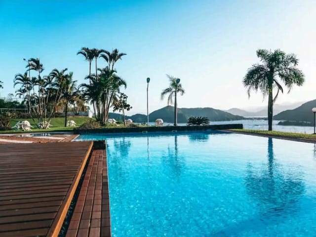 Foto do Apartamento - Belíssimo apartamento com 3 dormitórios à venda, 155 m² por R$ 1.382.000 - Perequê-Açu - Ubatuba/SP | RUSSI IMÓVEIS