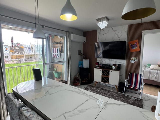 Foto do Apartamento - Apartamento à venda no Residencial Maria Clara Umuharama, Pelotas, 57m², 2 dormitórios, mobiliado, com churrasqueira, lareira e ótima vista! | UP Imóveis