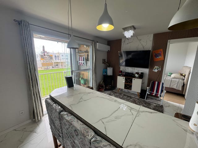 Foto do Apartamento - Apartamento à venda no Residencial Maria Clara Umuharama, Pelotas, 57m², 2 dormitórios, mobiliado, com churrasqueira, lareira e ótima vista! | UP Imóveis