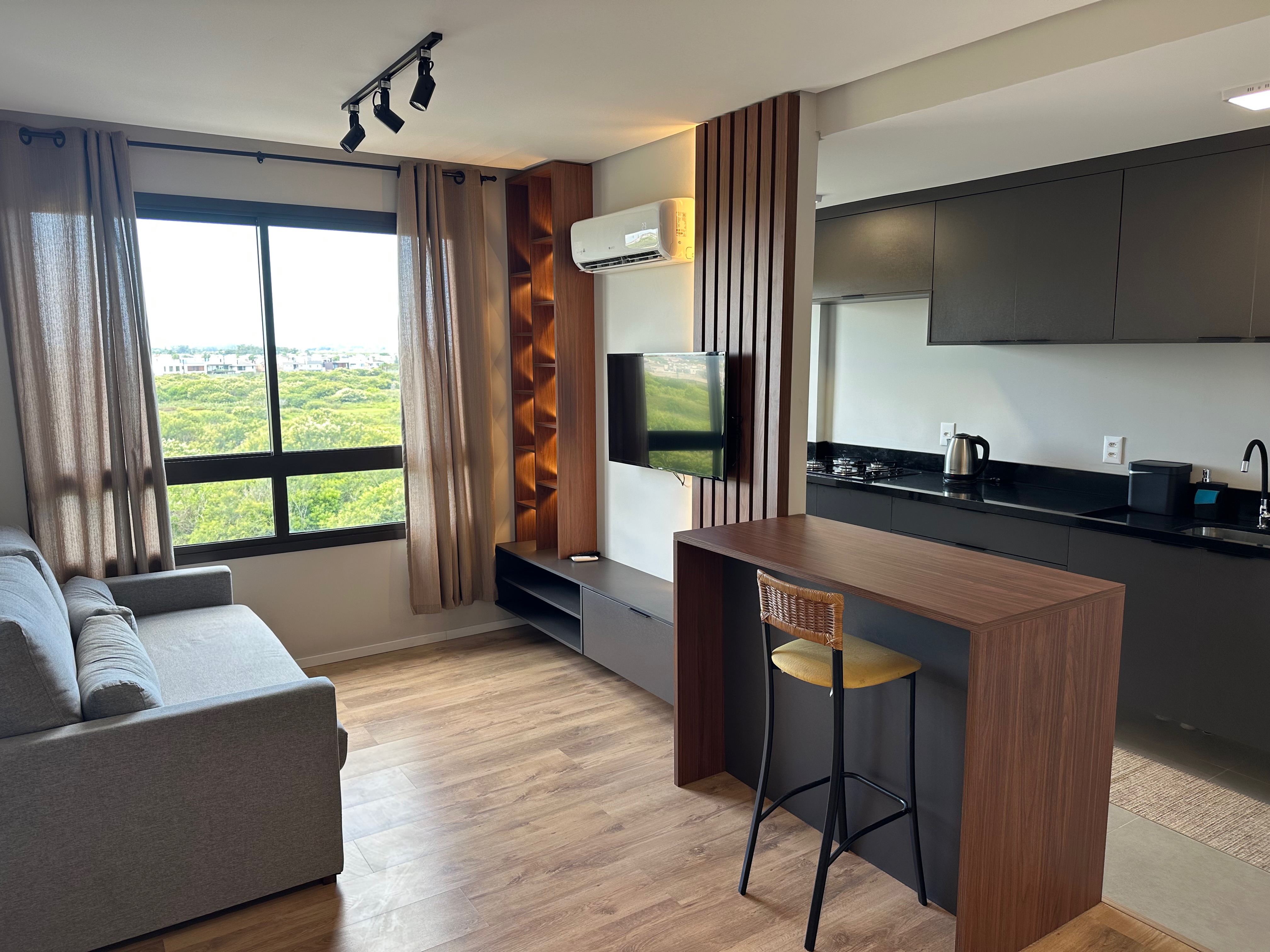 Apartamento mobiliado à venda no Aurora, Parque Una - 40 m², 1 quarto, móveis planejados e churrasqueira.
