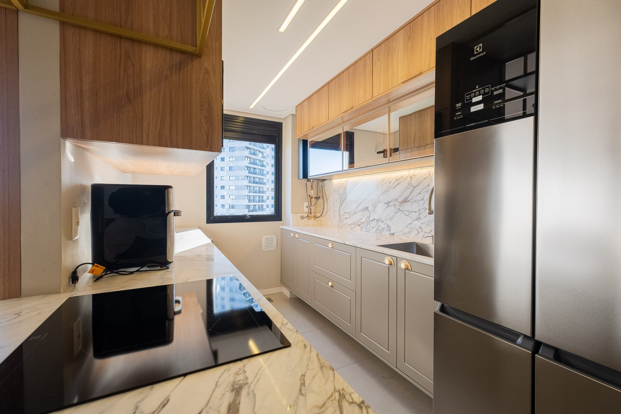 Apartamento mobiliado à venda no Canto, Parque Una - 64 m², 2 quartos (sendo 1 suíte), churrasqueira e acabamentos de alto padrão. - 6