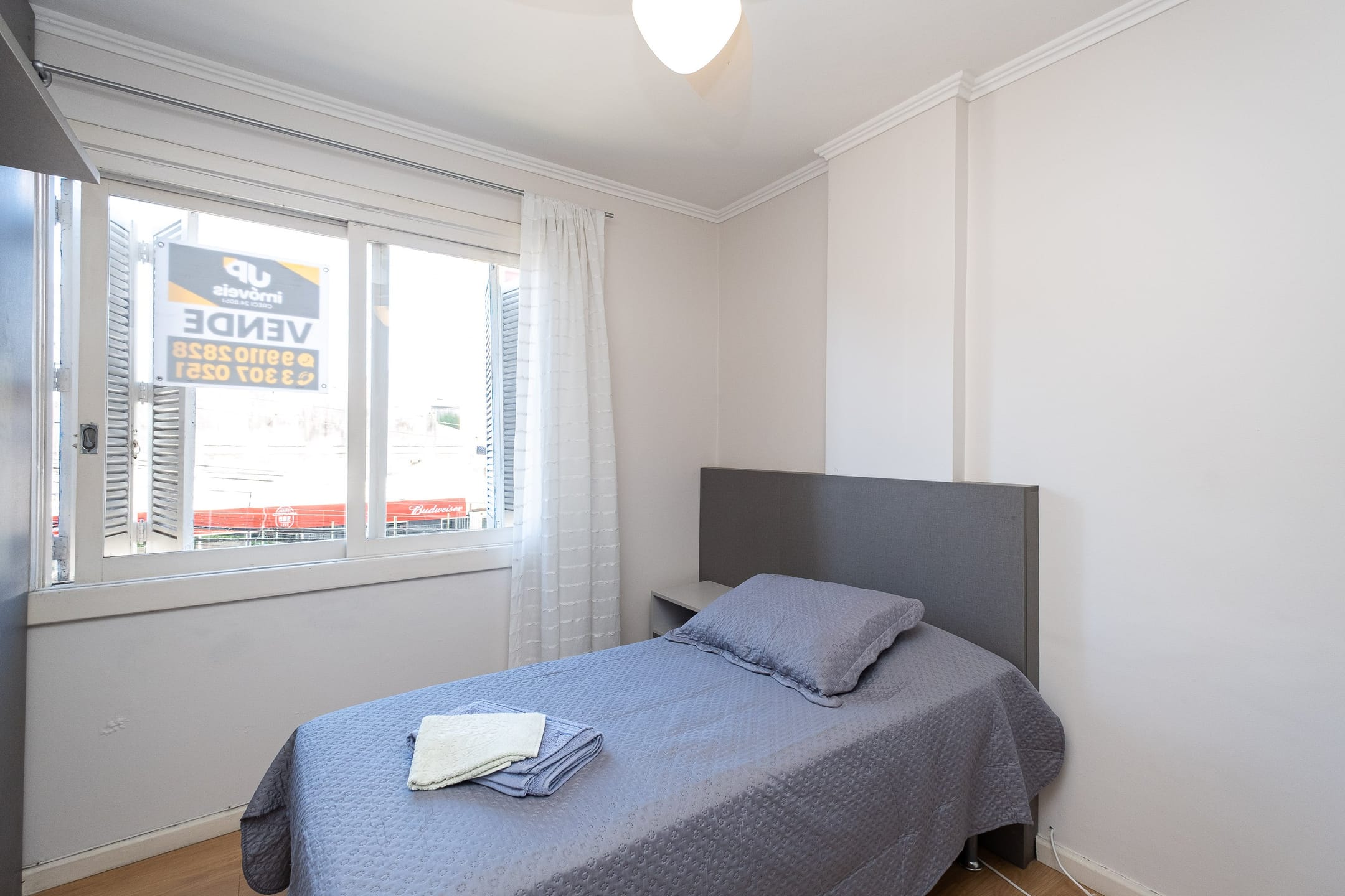 Apartamento mobiliado à venda no Edifício Cristina, Centro - 119 m², 3 quartos (sendo 1 suíte), cozinha planejada, face norte e vaga coberta. - 12