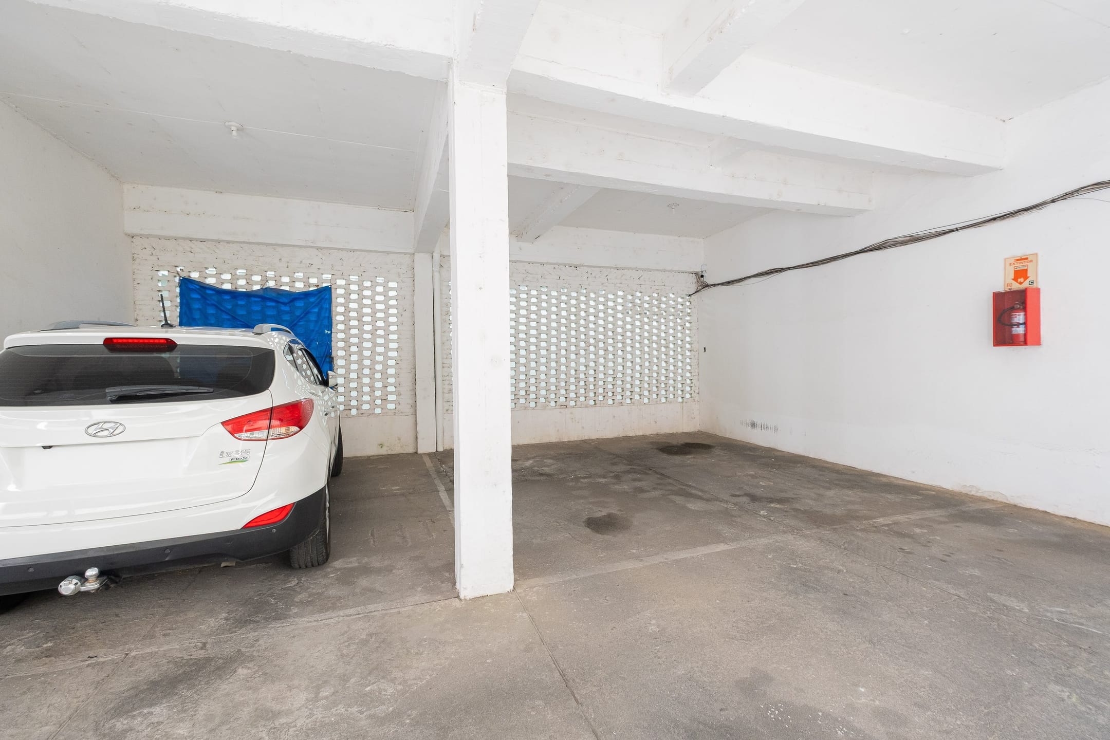 Apartamento à venda no Centro de Pelotas - 70 m², 2 quartos, cozinha com armários e vaga coberta. - 15