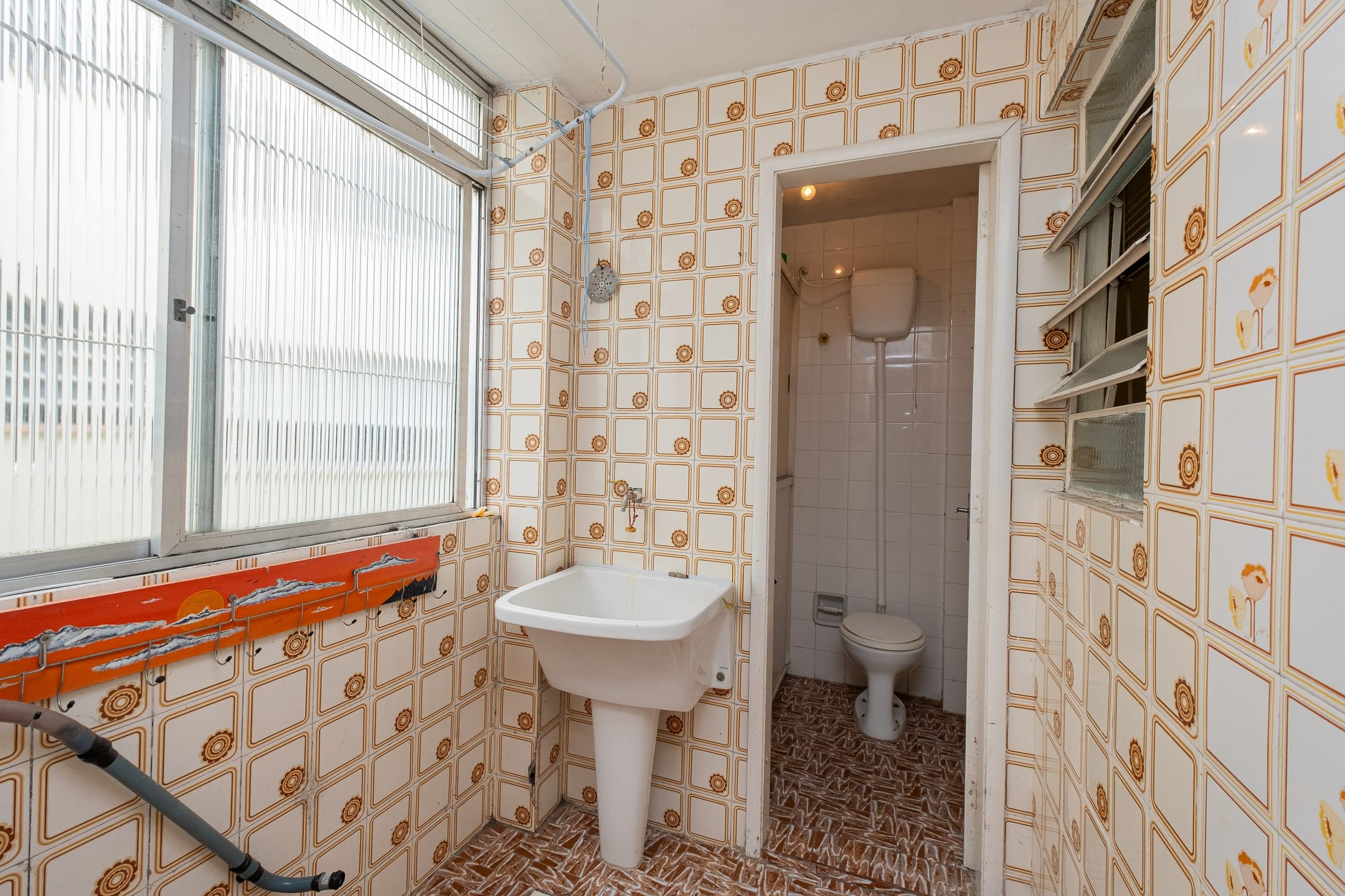 Apartamento à venda no Centro de Pelotas - 70 m², 2 quartos, cozinha com armários e vaga coberta. - 13