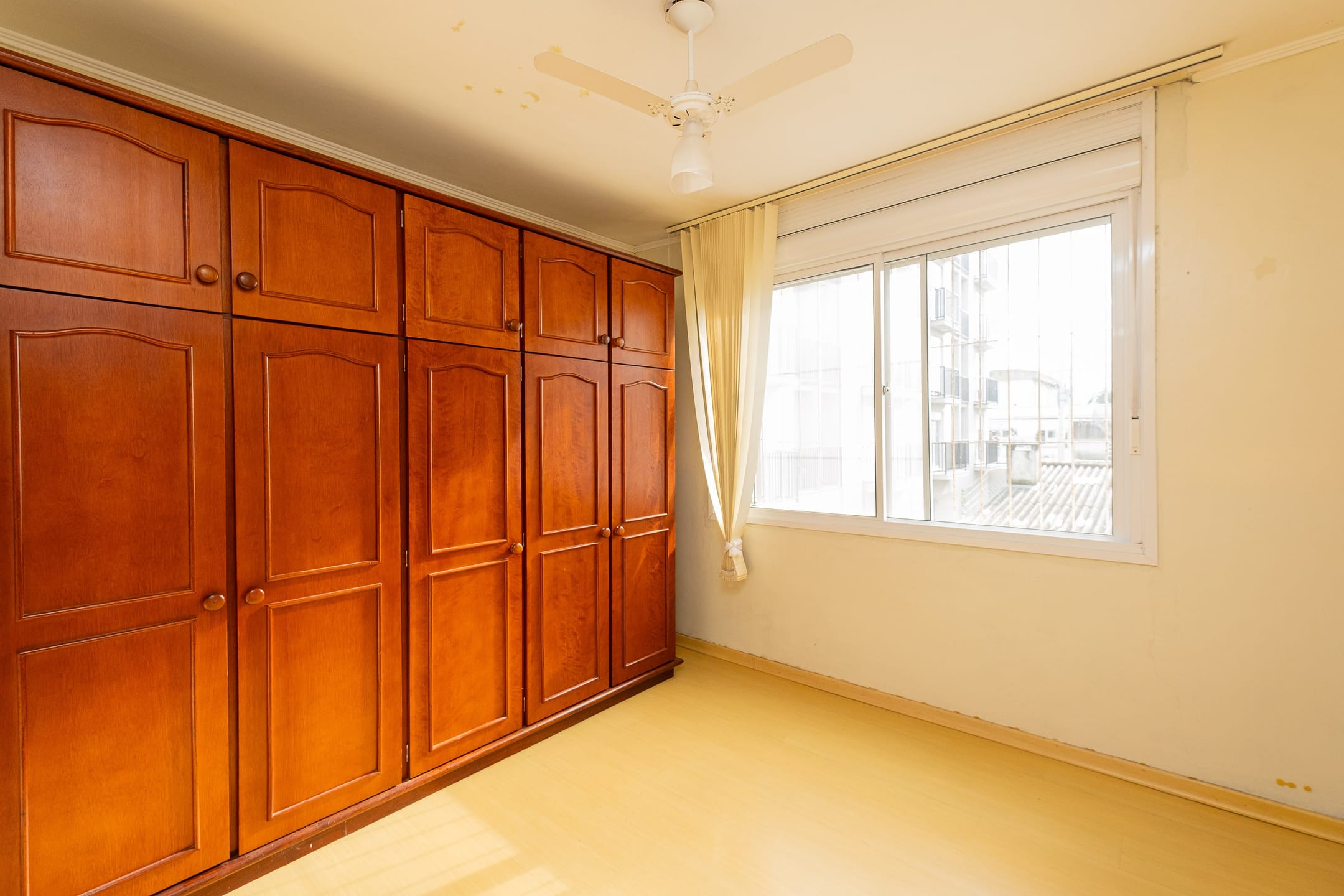 Apartamento à venda no Centro de Pelotas - 70 m², 2 quartos, cozinha com armários e vaga coberta. - 6