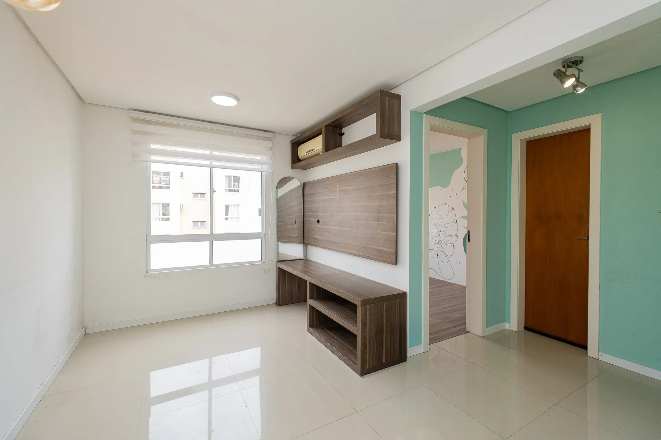 Apartamento à venda no Edifício Parque Central, centro de Pelotas - 50 m², 1 quarto, cozinha planejada e vaga.