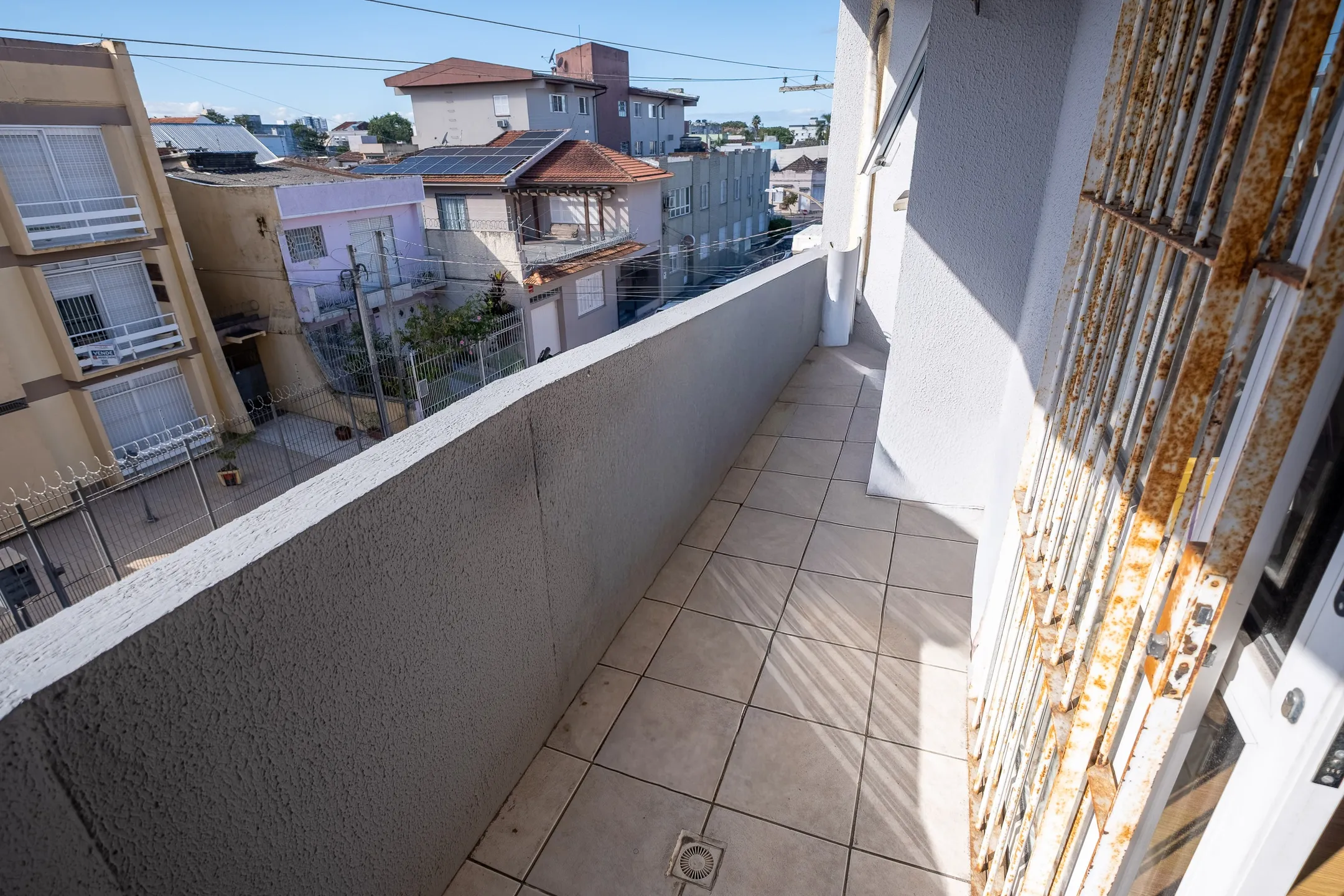 Apartamento à venda no Residencial Núbia, Centro - 87 m², 2 quartos, piso laminado, sacada com face Norte e vaga coberta. - 12