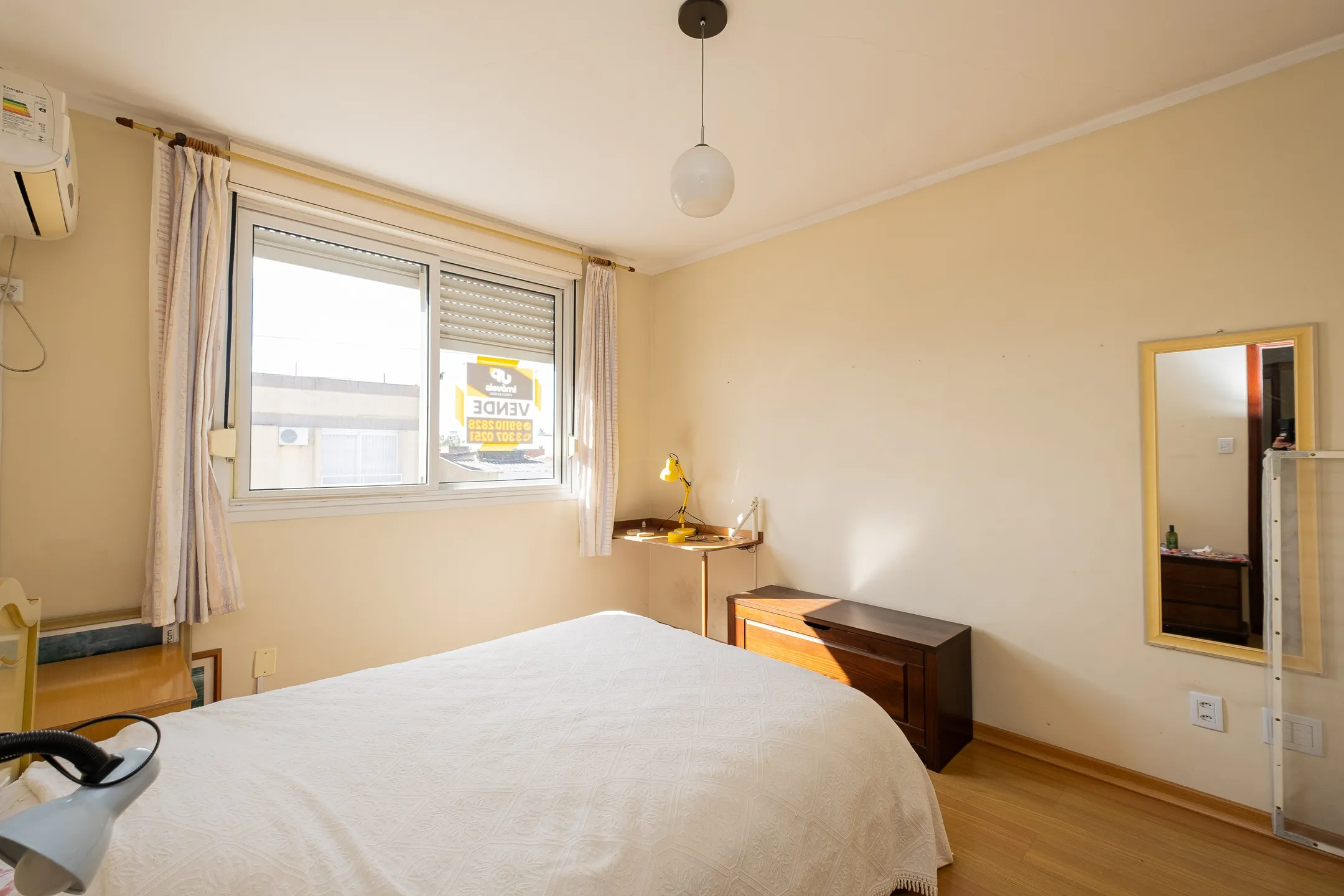 Apartamento à venda no Residencial Núbia, Centro - 87 m², 2 quartos, piso laminado, sacada com face Norte e vaga coberta. - 6