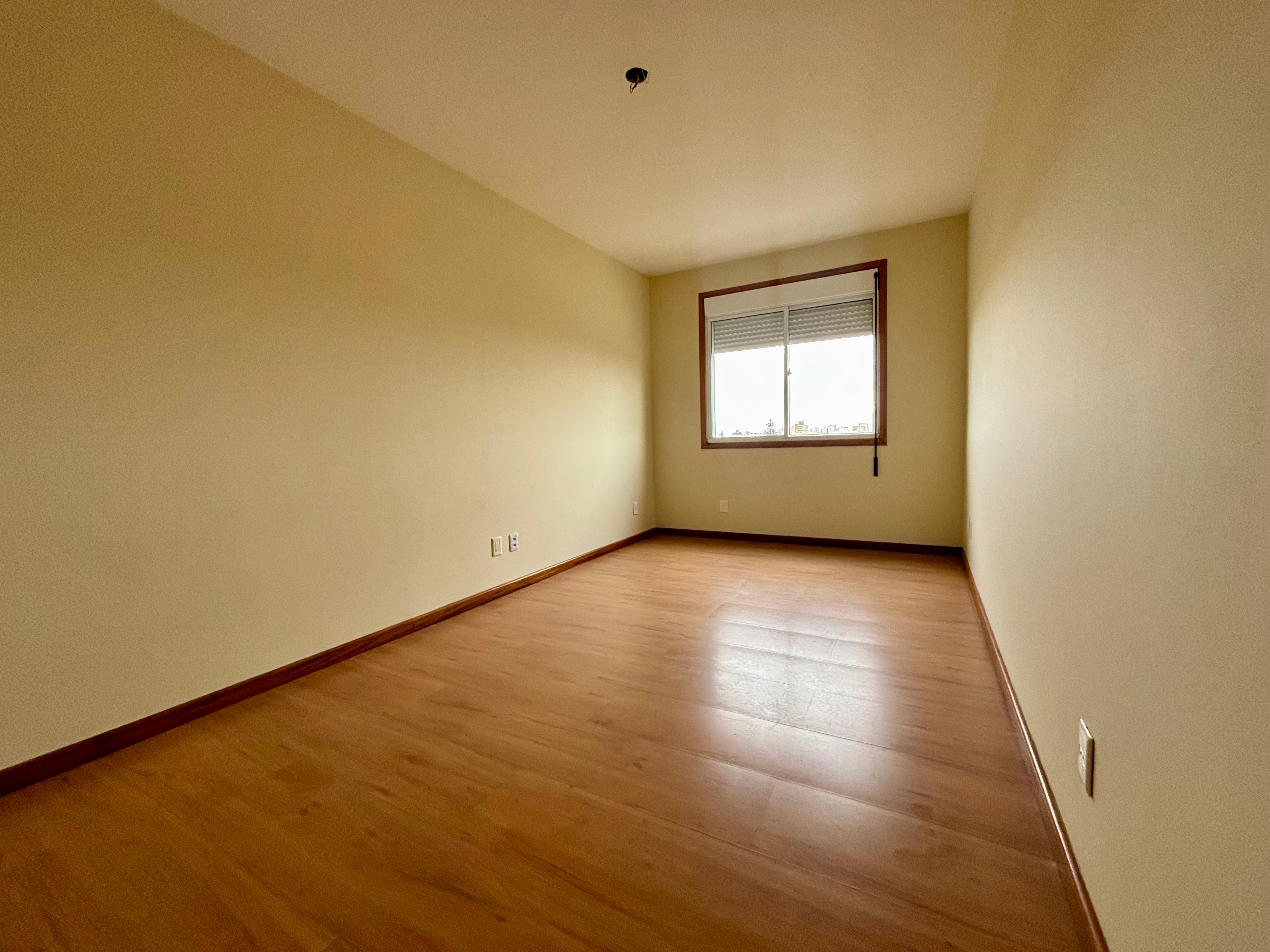 Apartamento à venda no Condomínio Ary Signorini, Centro - 113 m², 3 quartos (sendo 1 suíte), sacada com churrasqueira e vaga coberta. - 7