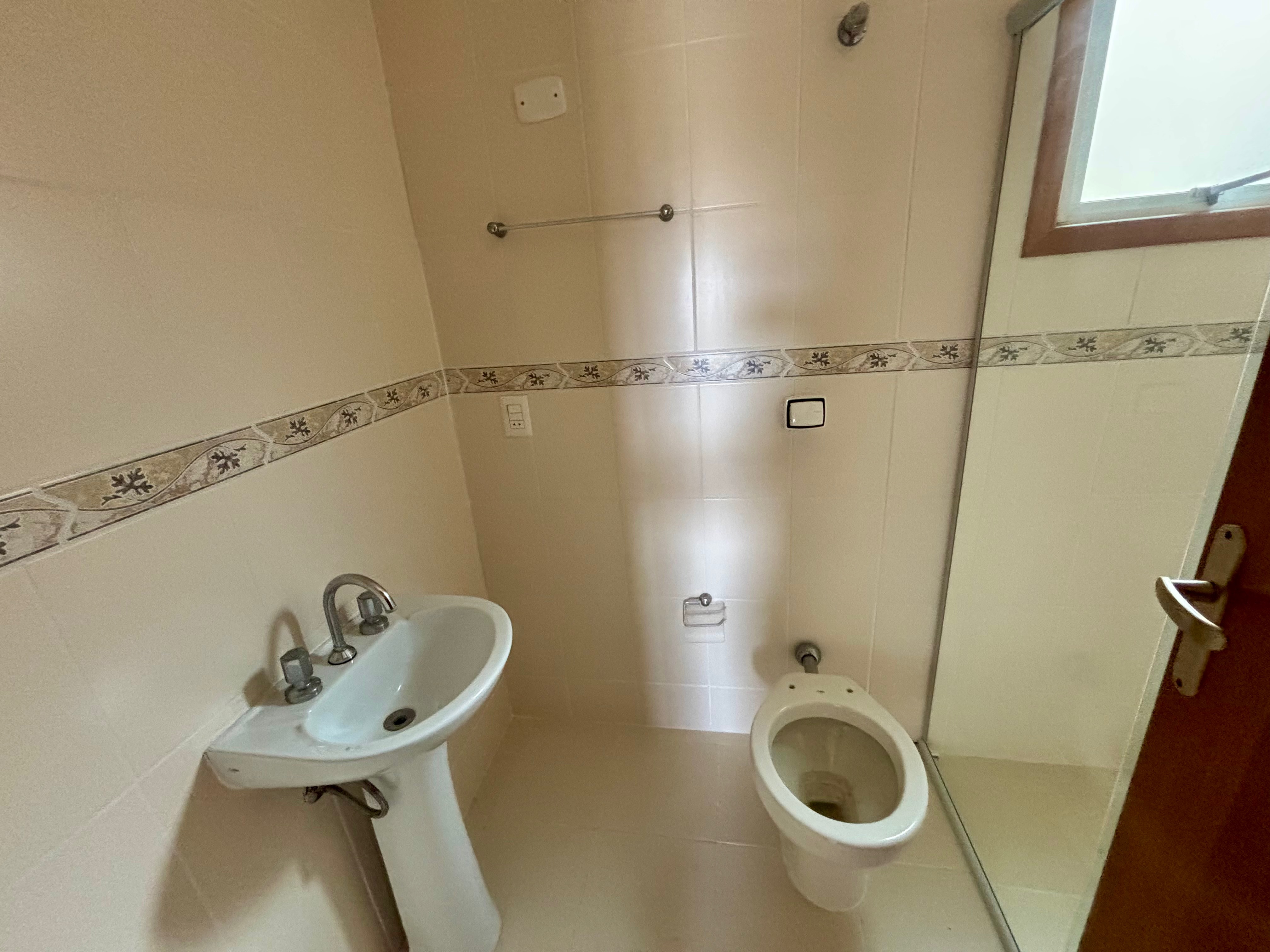 Apartamento à venda no Condomínio Ary Signorini, Centro - 113 m², 3 quartos (sendo 1 suíte), sacada com churrasqueira e vaga coberta. - 6