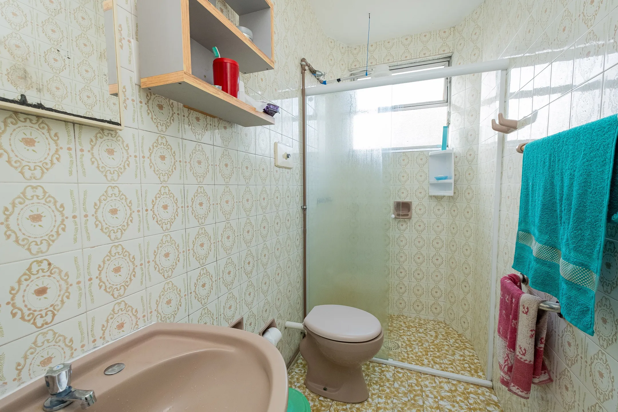 Apartamento à venda no Edifício Dagmar, Centro - 94 m², 4 quartos (sendo 1 suíte), cozinha com armários e vaga coberta. - 12