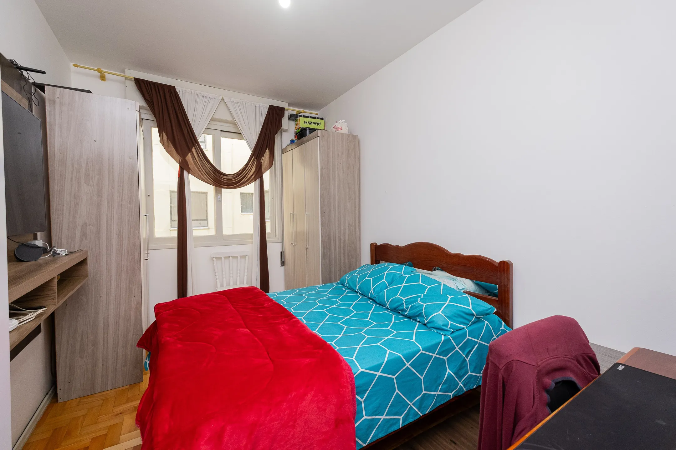 Apartamento à venda no Edifício Dagmar, Centro - 94 m², 4 quartos (sendo 1 suíte), cozinha com armários e vaga coberta. - 6