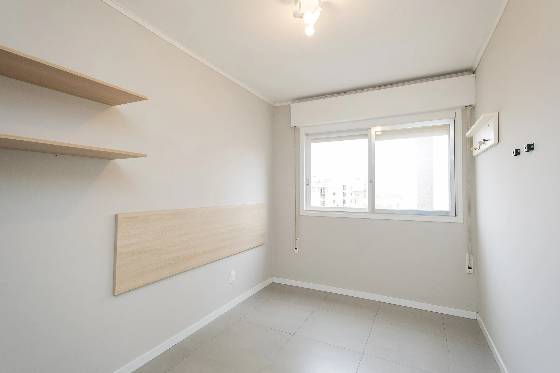 Apartamento mobiliado para locação na Rua Argolo, Centro de Pelotas, com 2 quartos, vaga de garagem e pronto para morar. - 7