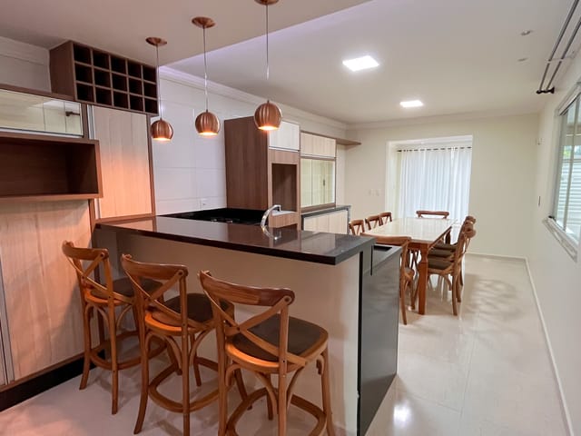 Foto do Casa - Casa com piscina e área de festas ampla á venda, com 220m² construídos e terreno de 420m² Nossa Senhora de Lurdes, Xanxerê. Por R$1.060.000,00 | CM Negócios imobiliários