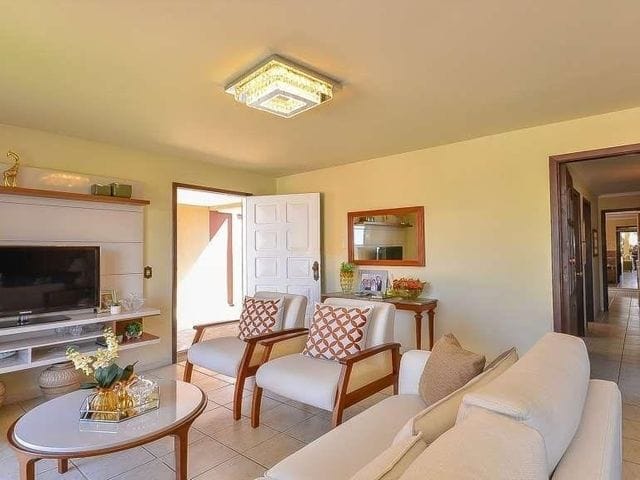 Foto do Casa - Casa térrea à venda, 03 Quartos sendo 01 suíte, 117m² averbada, área total do terreno 411,30 m², 02 vagas de garagens, Barreirinha, Curitiba, PR | Imobiliária GreenVille