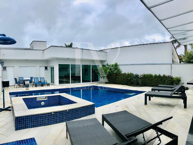 Foto do Casa - Casa de Praia em condomínio Morada da Praia, para Venda em Bertioga, 5 dormitórios, 5 suítes, 7 banheiros, 4 vagas | Tamara Velloso Corretora de Imóveis