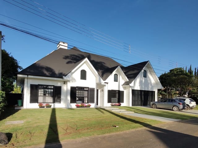 Foto do Casa - Casa térrea estilo americana no Condomínio Palm Park em Holambra, SP, com amplo jardim e muito bom gosto! | Conecte Imóvel