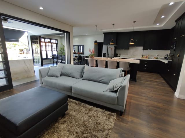 Foto do Casa - Casa térrea estilo americana no Condomínio Palm Park em Holambra, SP, com amplo jardim e muito bom gosto! | Conecte Imóvel