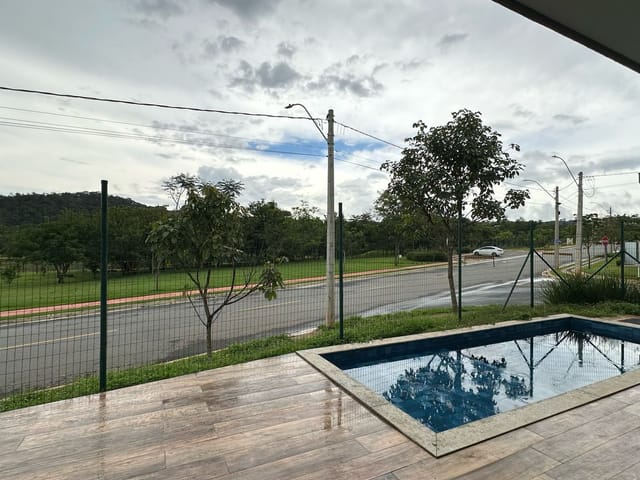 Foto do Casa - Casa com 3 dormitórios à venda, 197 m² por R$ 1.350.000,00 - Jardins Porto - Senador Canedo/GO | Portfolio Imóveis