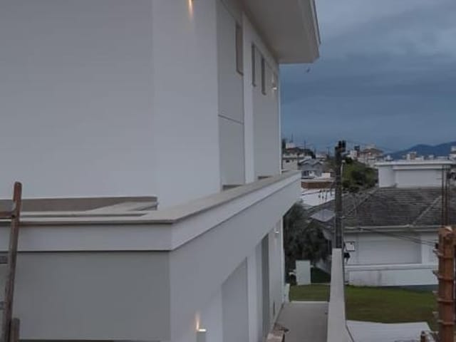 Foto do Casa - Casa à venda, com 04 dormitórios, sendo 3 suítes na Pedra Branca, Palhoça | Elite Imóveis