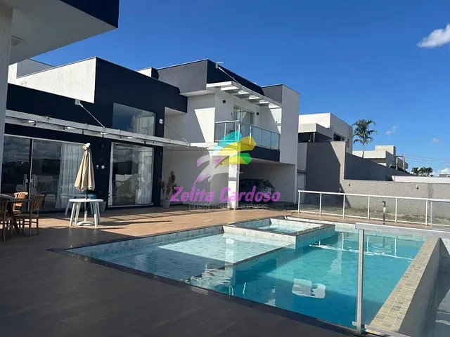 Casa com 1400m² 4 quartos e 5 banheiros, à venda ou para alugar, no bairro Condomínio Aldeias do Lago (Melo Viana) em Esmeraldas